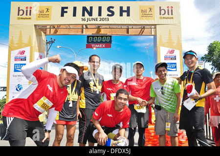 Glücklich Läufer an BII Bali Marathon 2013 teilnehmen. Stockfoto