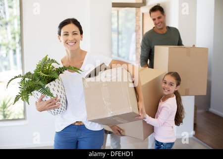 Familie Umzug in neues Haus Stockfoto