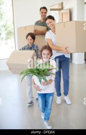 Familie Umzug in neues Haus Stockfoto