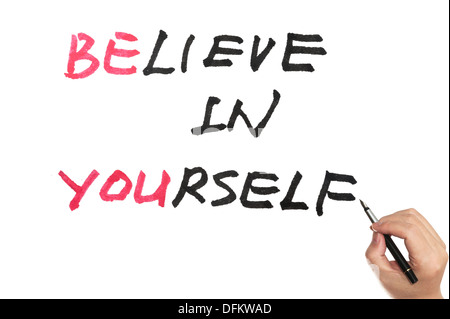 Werden Sie und glaubt an euch Worte geschrieben am Whiteboard Stockfoto