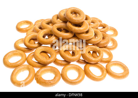 Viele Bagels auf weißem Hintergrund Stockfoto