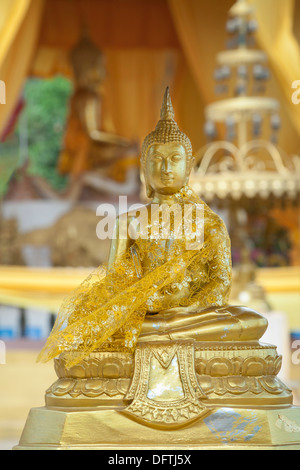 Eine goldene Buddha-Statue Phra Yot Tempel, Provinz Trang, Thailand Stockfoto