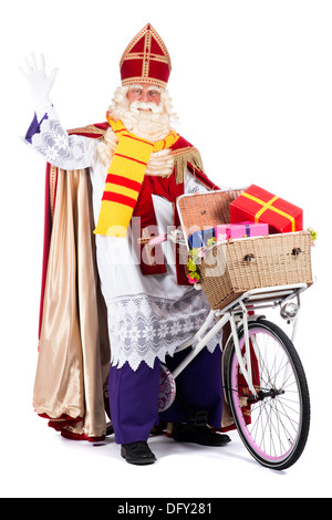 Sinterklaas auf einem Fahrrad, präsentiert gonna bringen den Kindern Stockfoto