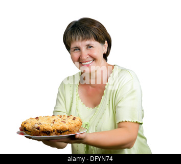 Porträt einer Frau mittleren Alters hält eine hausgemachte Stockfoto