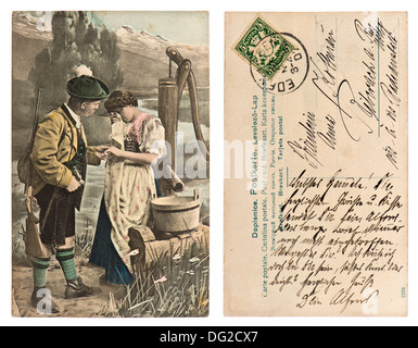 Deutschland - ca. 1907: seltene antike deutsche Postkarte von 1907 zeigt sentimental paar im typischen Dirndlrock. Stockfoto