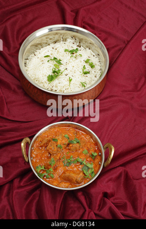 Lamm Rogan Josh, serviert mit Reis Jeera (Kreuzkümmel) Stockfoto