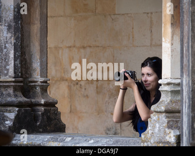 Junge Frau fotografieren Stockfoto