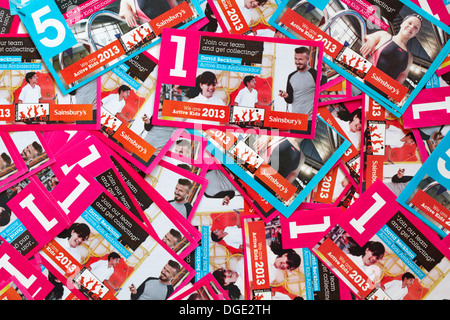 Pile of Sainsbury WE are Active Kids 2013 Gutscheine Sainsbury's Sainsbury Stockfoto