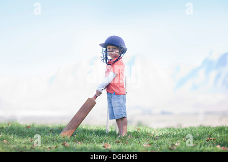 Junge mit Kricketschläger Stockfoto