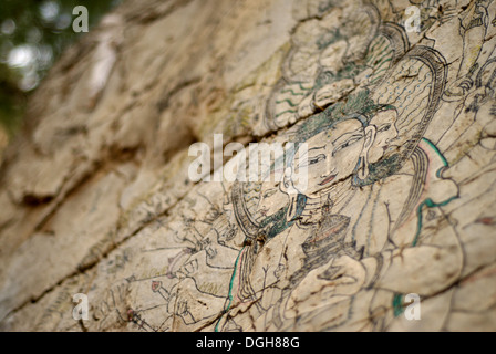 Avalokiteshvara Buddha gemalt auf dem Felsen im Atlantis, versteckt vor Ort auf Ibiza Stockfoto