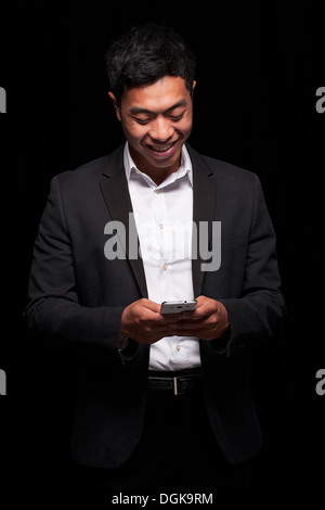 Geschäftsmann mit smartphone Stockfoto