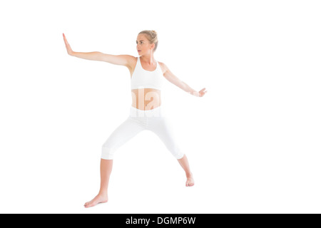 Getönten fokussierte Blondine Yoga Übung Stockfoto