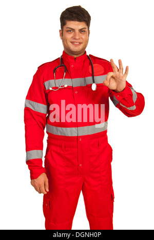 Erfolgreiche Sanitäter Mann zeigt Ordnung Zeichen hand Geste isoliert auf weißem Hintergrund Stockfoto