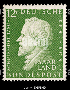 Saarland-Briefmarke - deutscher Ökonom Franz Hermann Schulze-Delitzsch (1808-1993) für die ersten Kreditgenossenschaften zuständig. Stockfoto
