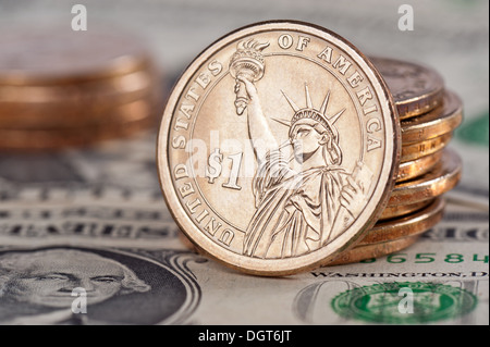 1 Dollar Münzen und Scheine Stockfoto