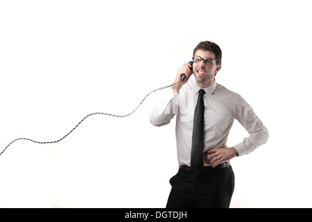 Büroangestellte, ruft jemand mit einem Telefon Stockfoto