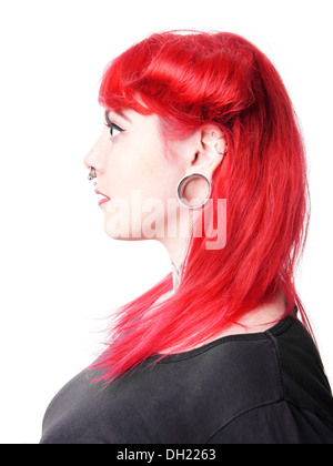 junge Frau mit Gesichts-Piercings und tattoos Stockfoto