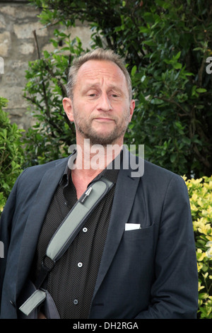 6. Angouleme französischsprachige Film Festival (Südwesten Frankreichs): Benoît Poelvoorde posieren bei einem Fototermin auf 2013/08/24 Stockfoto