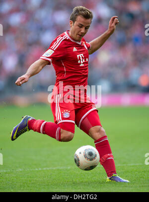 München, Deutschland. 26. Oktober 2013. Münchner Mario Goetze während der Bundesliga-match zwischen FC Bayern München und Hertha BSC in Allianz Arena in München, 26. Oktober 2013. Foto: THOMAS EISENHUTH/Dpa/Alamy Live News Stockfoto