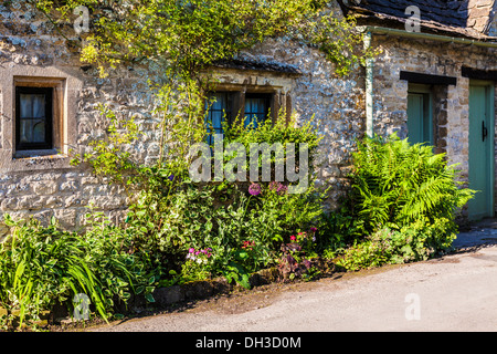 Bestandteil der berühmten Reihe von Weber Cottages, Arlington Row, erbaut im Jahre 1380 als Mönch Wolle Shop in Bibury, England. Stockfoto