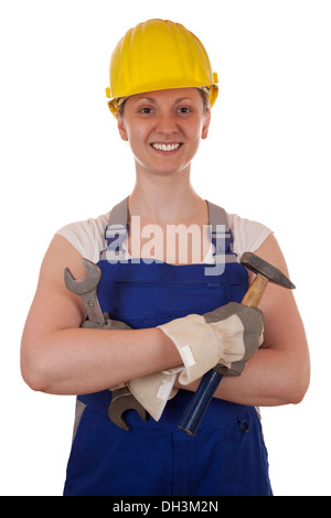 Junge Frau mit einem Hammer und Zange in der Hand, isoliert auf weiss Stockfoto