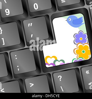 Vogel und Blumen auf Computer-Tastatur-Taste Stockfoto