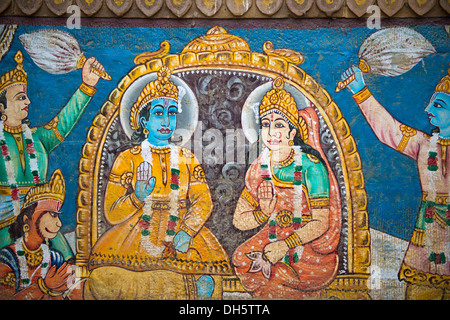 Der Gott Shiva und die Mutter Göttin Ganga gemalt an der Wand eines Hauses am Ufer des Flusses Ganges, Varanasi Stockfoto