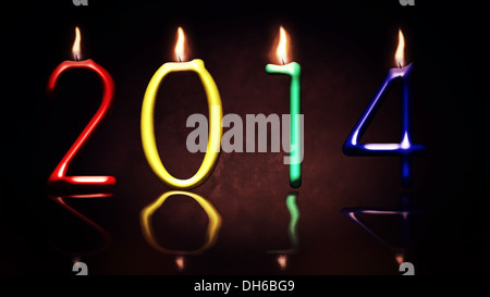 Neujahr 2014 mit mit Kerze Zahlen Stockfoto
