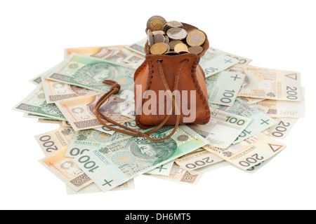 volle Geld-Beutel mit Münzen auf den Banknoten Stockfoto