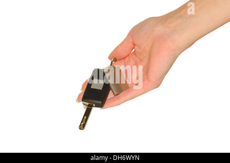 Elegante zarte Frauenhand mit neuen Autoschlüssel und Schlüsselbund isoliert auf weiss Stockfoto