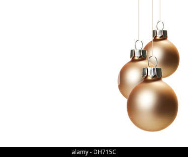 Weihnachten, drei braune Weihnachtskugeln isoliert Stockfoto