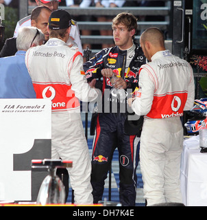 Jenson Button Sebastian Vettel und Lewis Hamilton n Mula One Grand Prix im Albert Park - Rennen Melbourne- Stockfoto