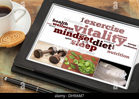 Vitalität und Lebensenergie-Konzept auf eine digital-Tablette, eine Collage aus Bildern und Wortwolke Stockfoto