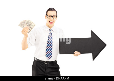 Junge aufgeregt Geschäftsmann mit einem großen schwarzen Pfeil rechts und US-Dollar Stockfoto