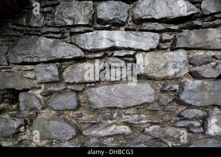 Nahaufnahme einer alt und rissig stoned Wand Stockfoto