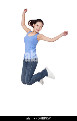 Junge Frau tanzen, Lächeln Stockfoto