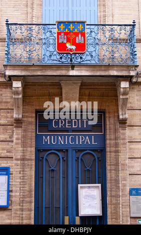 Jugendstil-Tür und Wappen von kommunalen Credit, credit Union, Rue des Lois, Toulouse, Haute-Garonne, Midi - Pyréneés, Occitanie, Frankreich Stockfoto