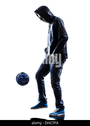 ein junger Mann Freestyler Fußballspieler in der Silhouette auf weißem Hintergrund Stockfoto