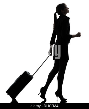 ein Geschäftsreisender Frau zu Fuß Silhouette Studio isoliert auf weißem Hintergrund Stockfoto