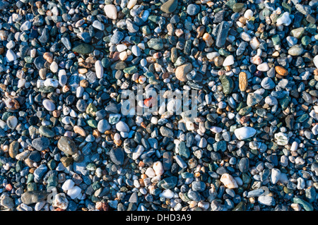 Stein Textur aus Kieselsteinen am Ufer des Meeres Stockfoto