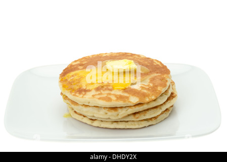 Pfannkuchen mit Schmelzen von Butter - Studio gedreht mit weißem Hintergrund Stockfoto