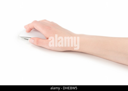 Zarte Frauenhand ist auf eine moderne Glas-Touch-Maus auf weißem Hintergrund. Stockfoto