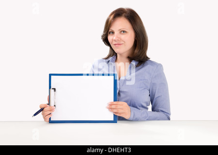 Geschäftsfrau hält eine leere Zwischenablage, Business-Konzept Stockfoto