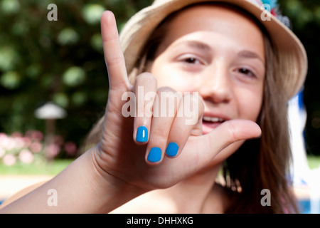 Mädchen mit lackierten Fingernägeln Stockfoto