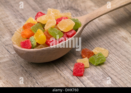 different dried fruits in wooden spoon on table Stockfoto