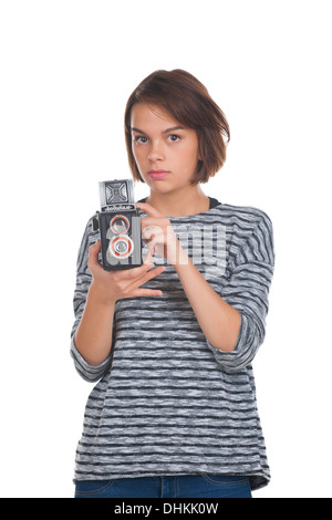 Schöne Teenager-Mädchen mit Retro-Foto-Kamera Stockfoto