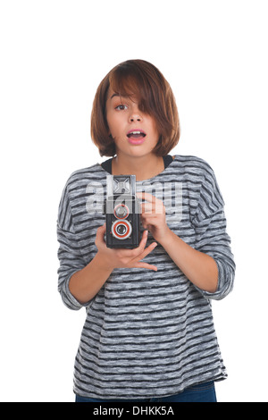 Schöne Teenager-Mädchen mit Retro-Foto-Kamera Stockfoto