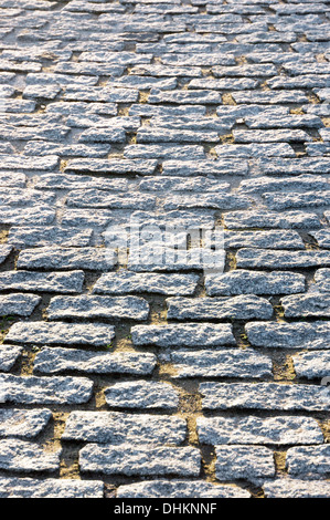 Hintergrund mit Bodenfliesen Granit Pflastersteine Stockfoto