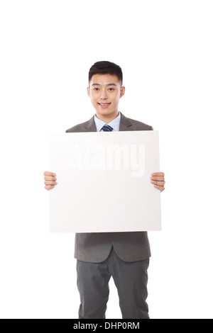 Junger Geschäftsmann Holding leeres Papier Stockfoto