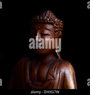 Buddha-Bildnis auf schwarzem Hintergrund Stockfoto